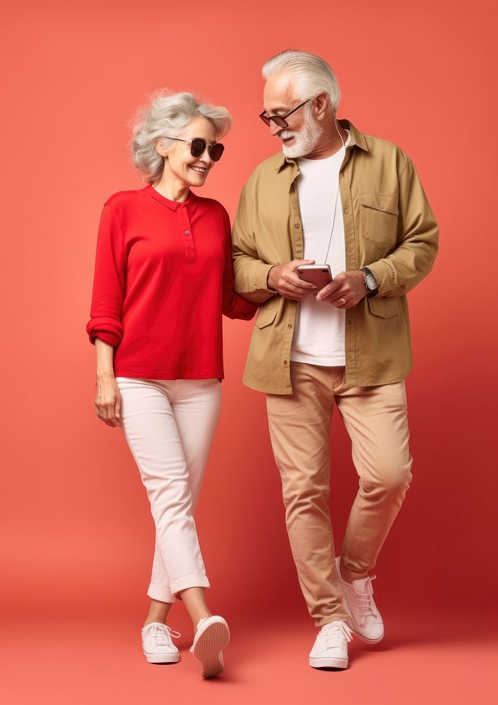 A senior couple with mobile phone glasses walking person. AI generated Image by rawpixel.