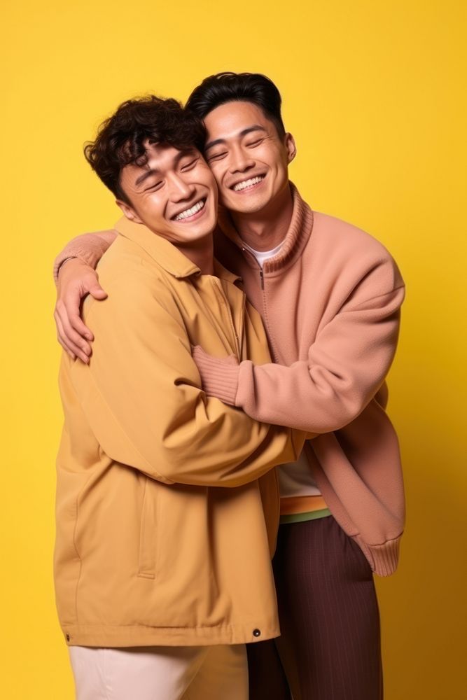 Japanese gay couple hugging portrait adult photo.