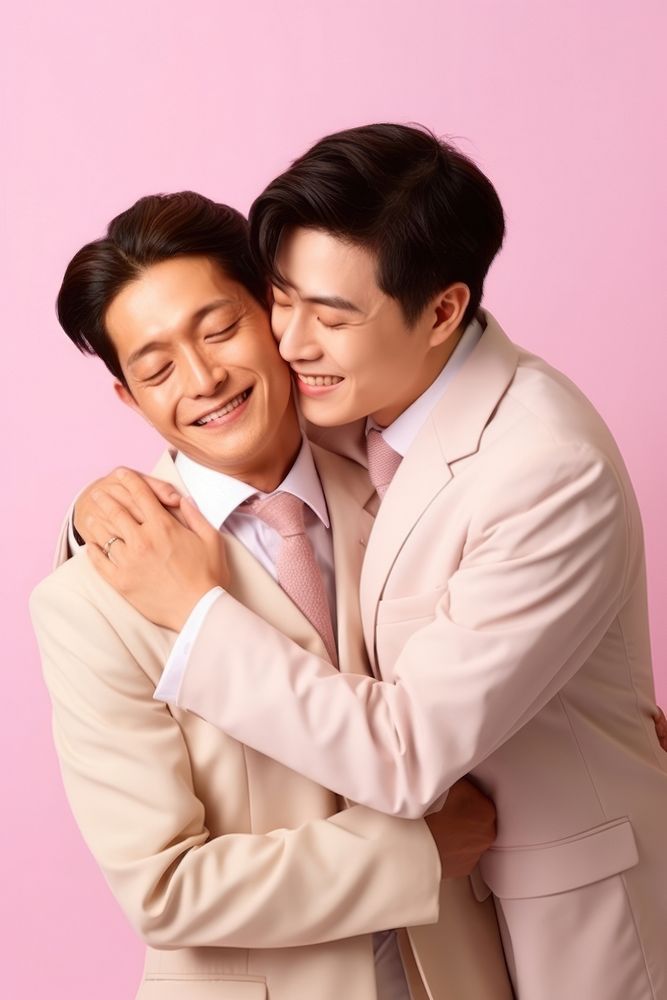 Japanese gay couple hugging adult love togetherness.