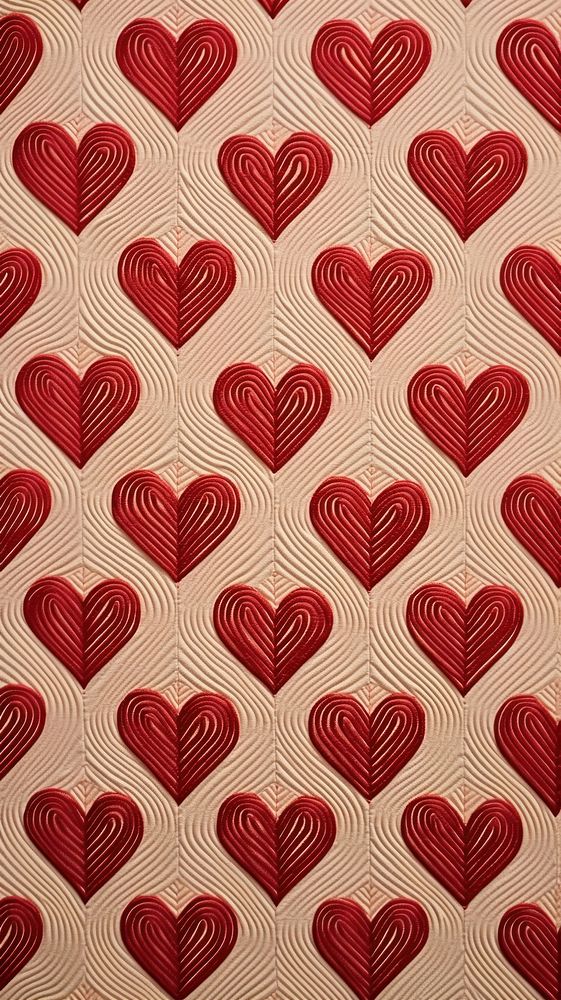 Embroidery of heart pattern textile backgrounds repetition.