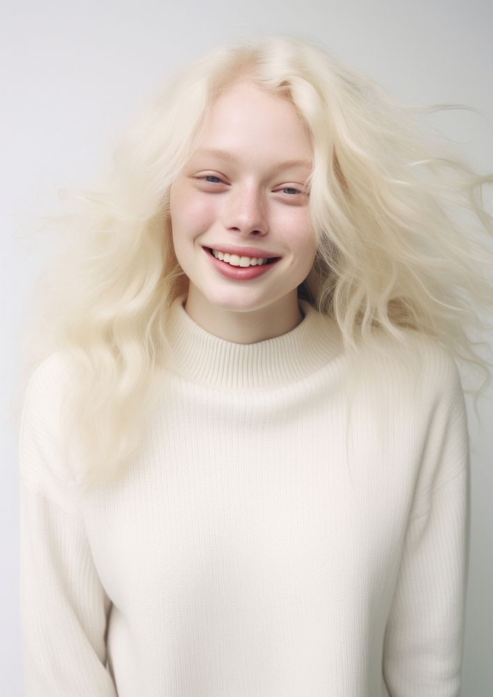 A happy albino woman wear cream sweater portrait fashion adult.