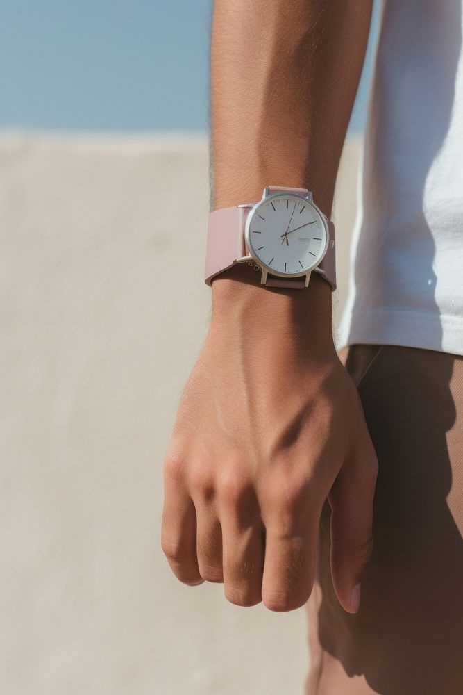 A hand wearing watch wristwatch bracelet deadline.