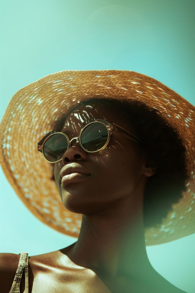 A stylist mixed race american-african woman photography sunglasses portrait.
