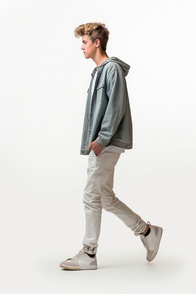 A teenager man walking in studio footwear sleeve jacket.