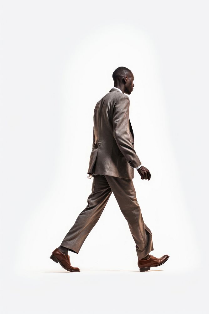A affrican man walking standing adult side view.