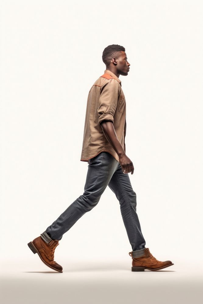 A affrican man walking footwear standing adult.