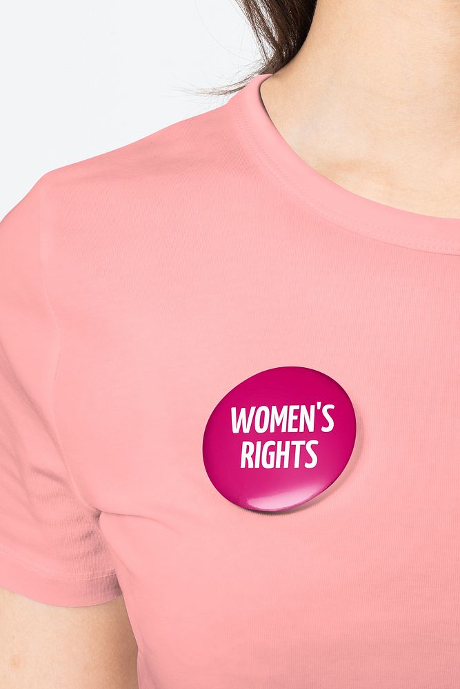 Women's rights pin button on pink t-shirt