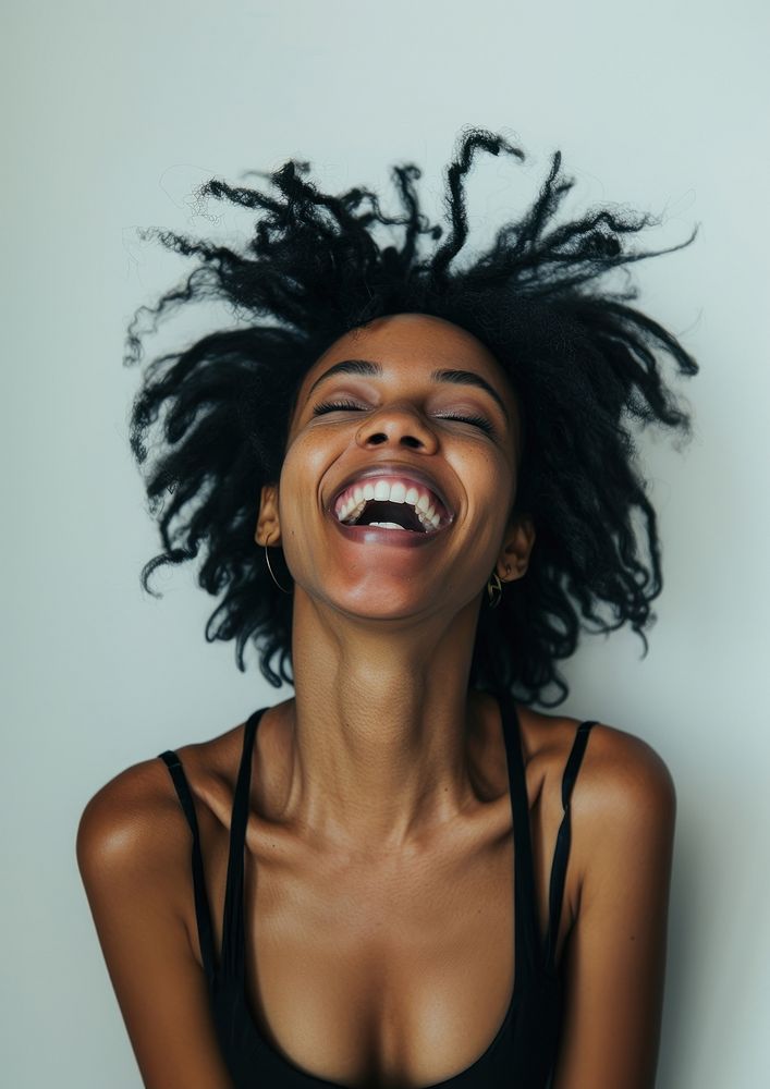 A laughing black woman happiness smile adult.