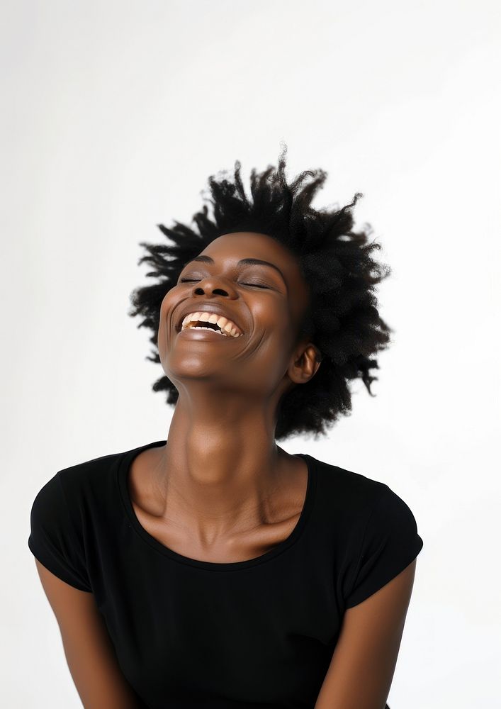 A laughing black woman smile relaxation happiness.