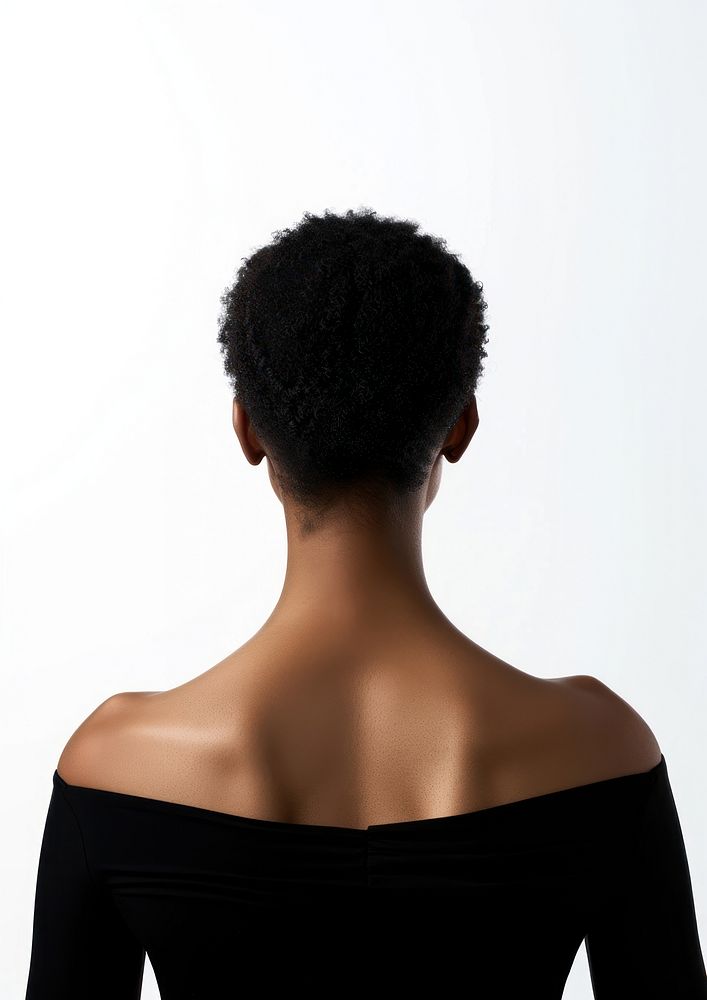 An African-American woman back adult white background.