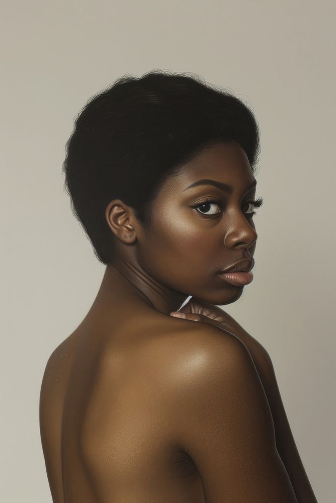 A black woman showcasing her back elegance portrait looking.