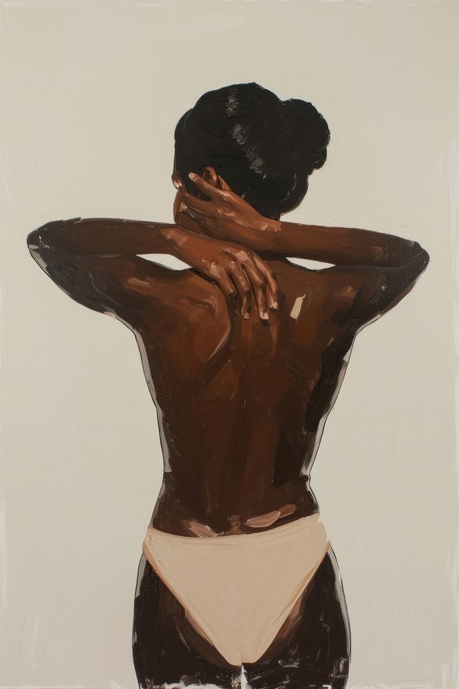 A black woman showcasing her back painting adult art.