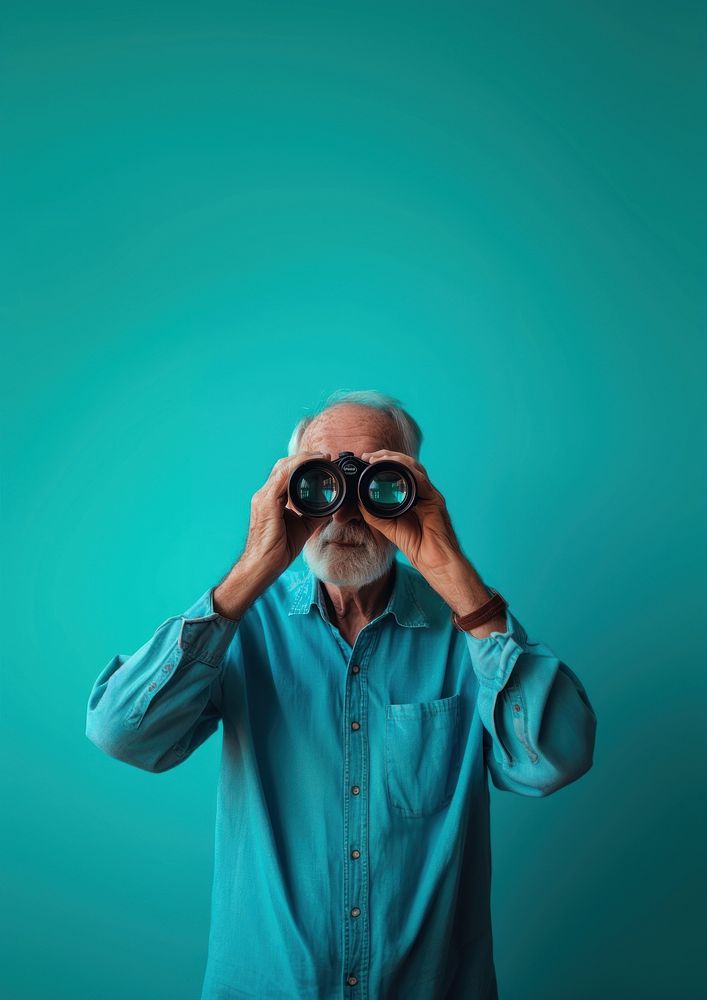 Old man using binoculars adult photo blue.