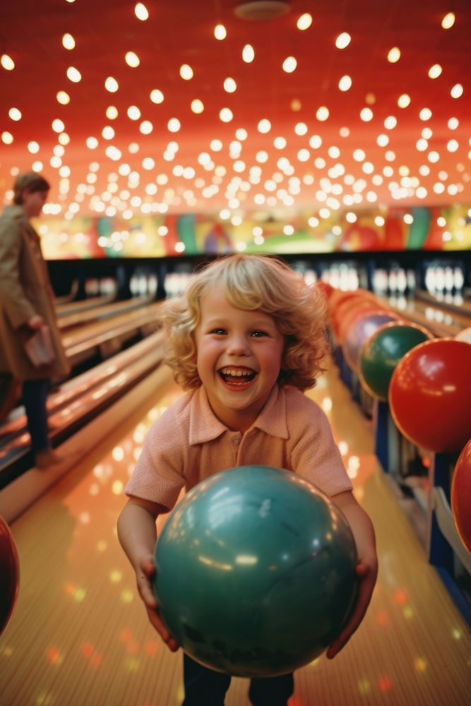 Boy fun at the bowling alley recreation portrait sports.
