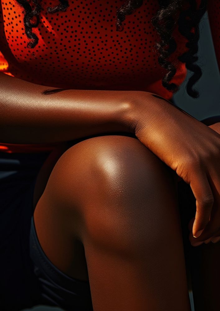 Black females bent knee adult midsection underwear.