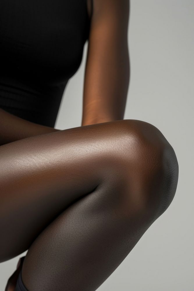 Black females bent knee adult gray monochrome.