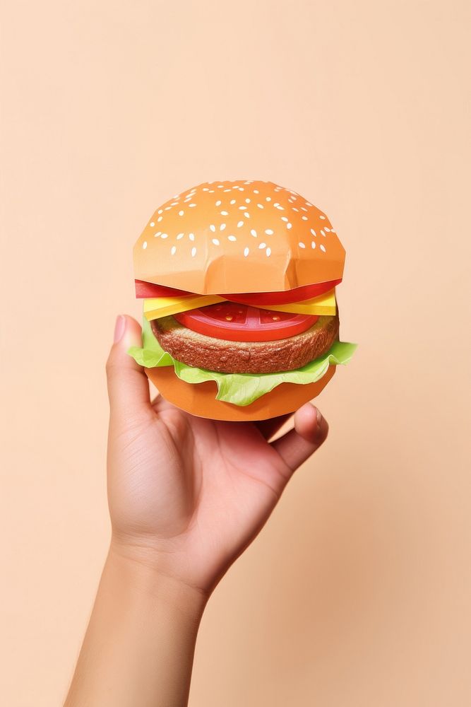 Hand holding Burger burger food hamburger.