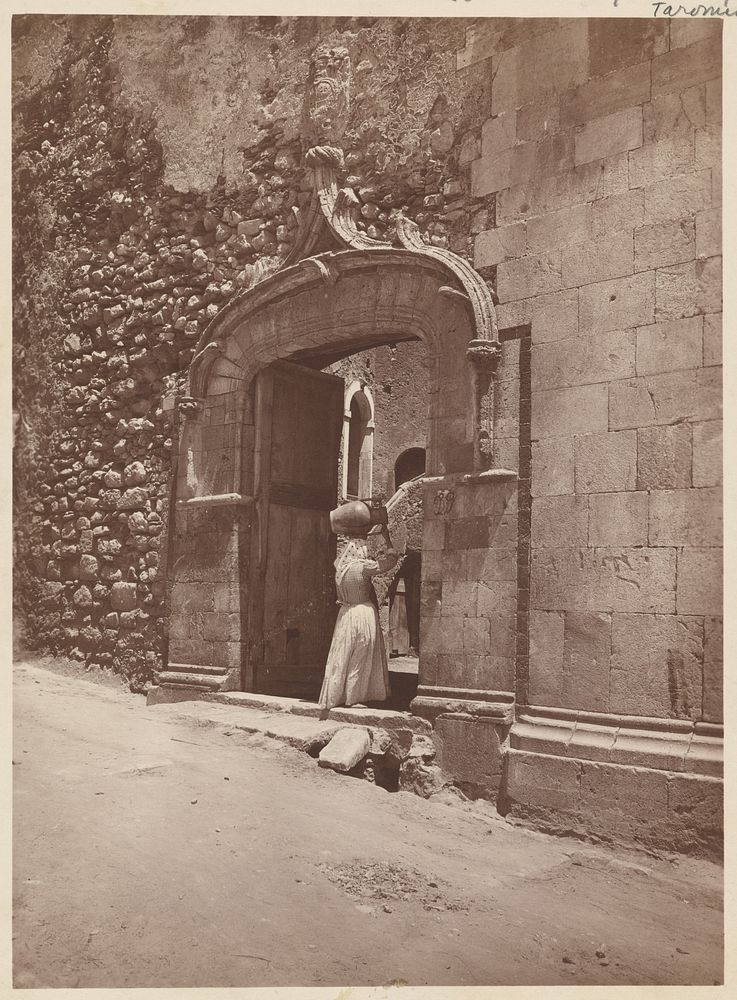 Woman entering gate by Baron Wilhelm von Gloeden