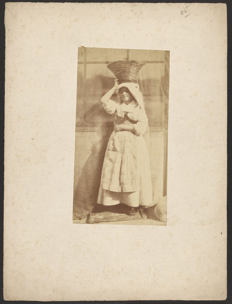 Woman with basket on head