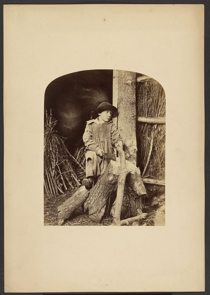 Boy chopping wood by Gertrude Elizabeth Rogers