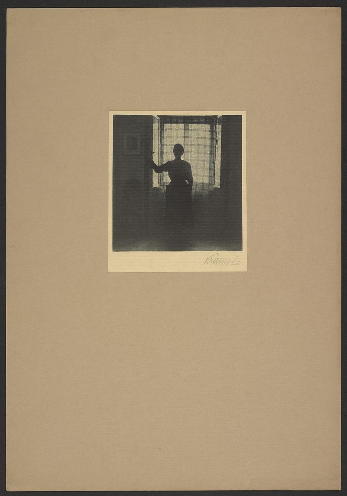 Woman in front of window by Günther Krampf