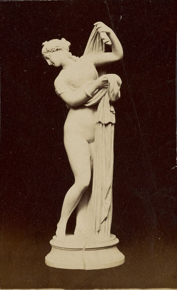Statue of nude female figure
