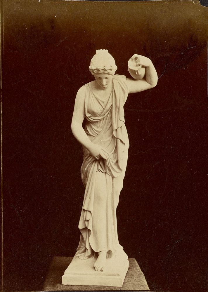 Statue of female figure with pitcher