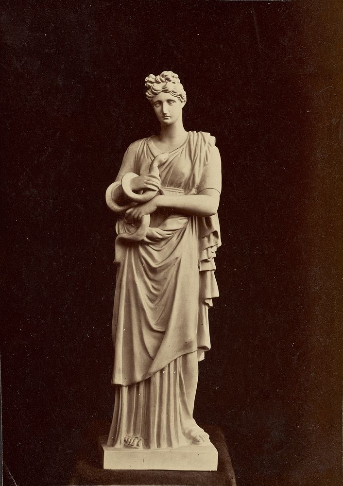 Statue of woman with snake
