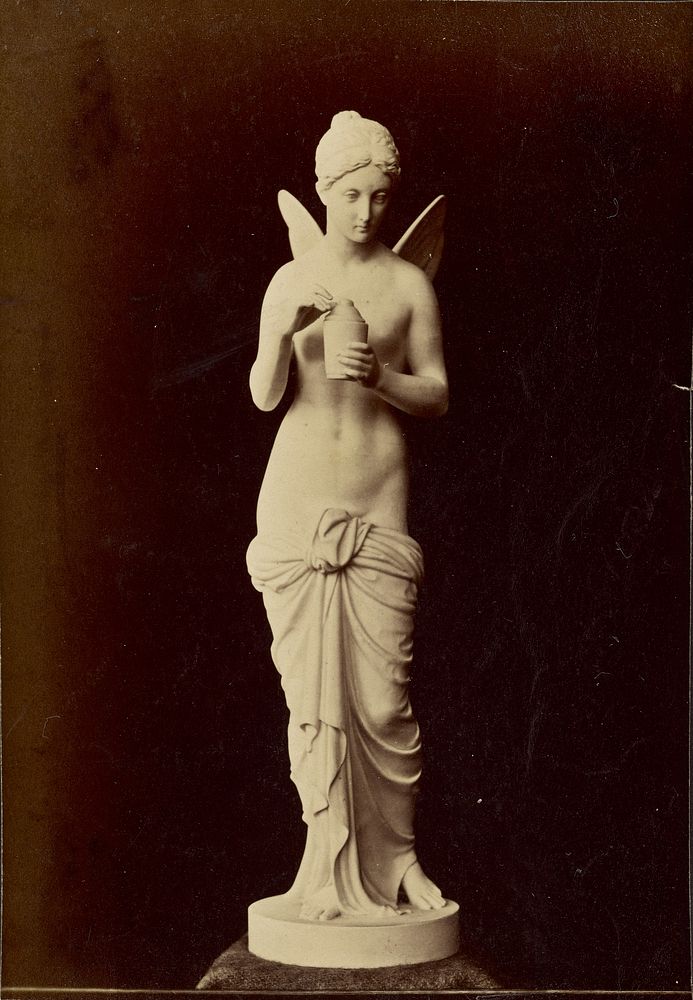 Statue of winged figure with pot