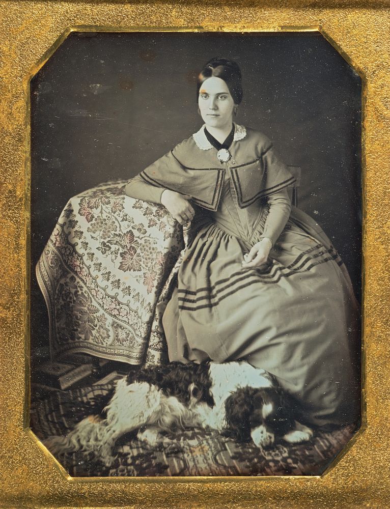 Portrait of a Seated Young Woman and Dog