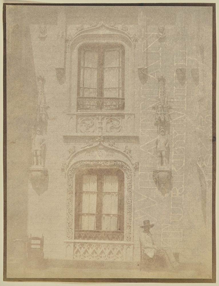 Man seated outside house of Comte de l'Escalopier by Hippolyte Bayard and Reverend Calvert Jones