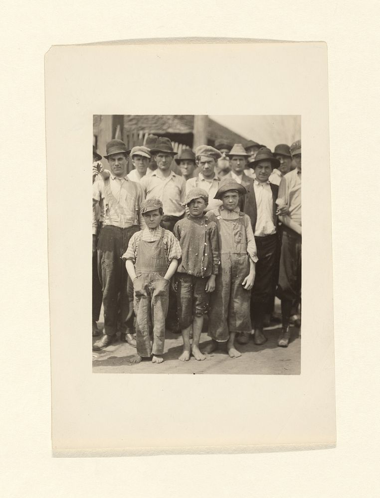 Three Young Mill Workers in front of Crowd by Lewis W Hine