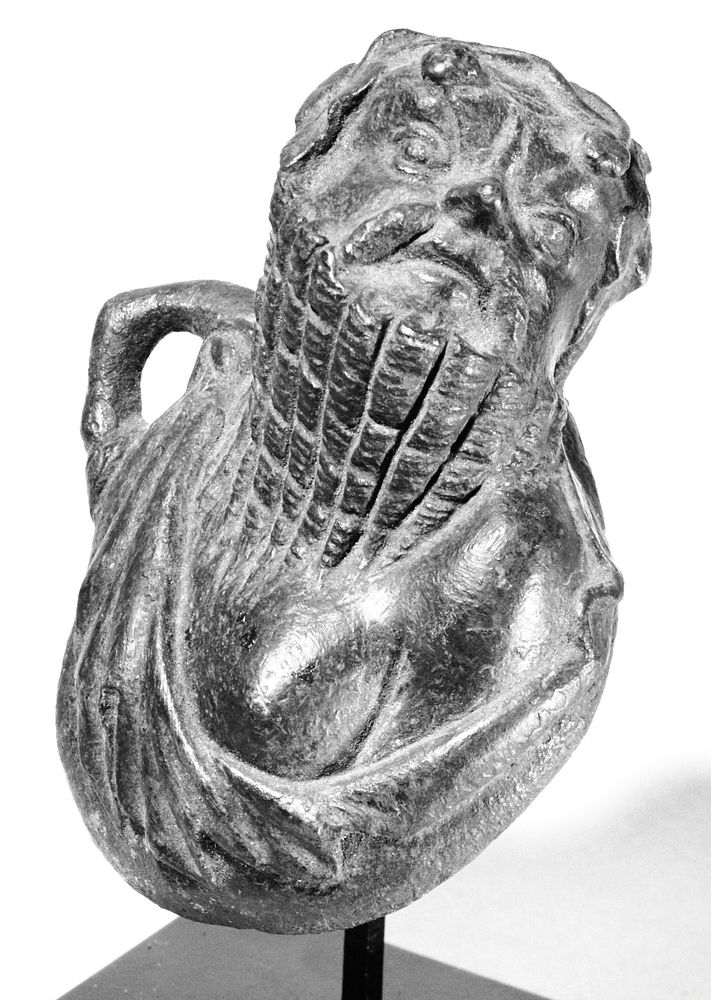 Applique of a Satyr Bust from a Kline