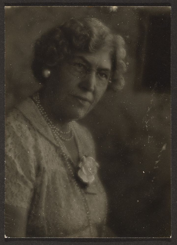 Woman with White Flower and Pearls by Louis Fleckenstein