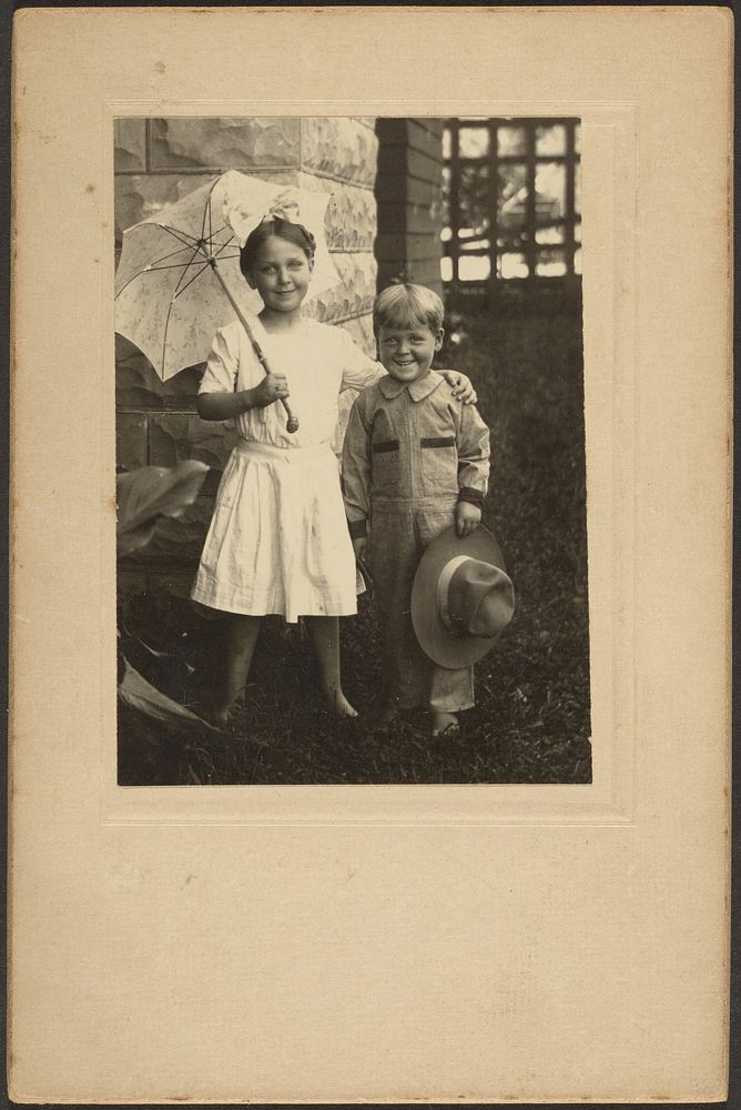Portrait of a Girl with Umbrella and a Boy with Hat by Louis Fleckenstein