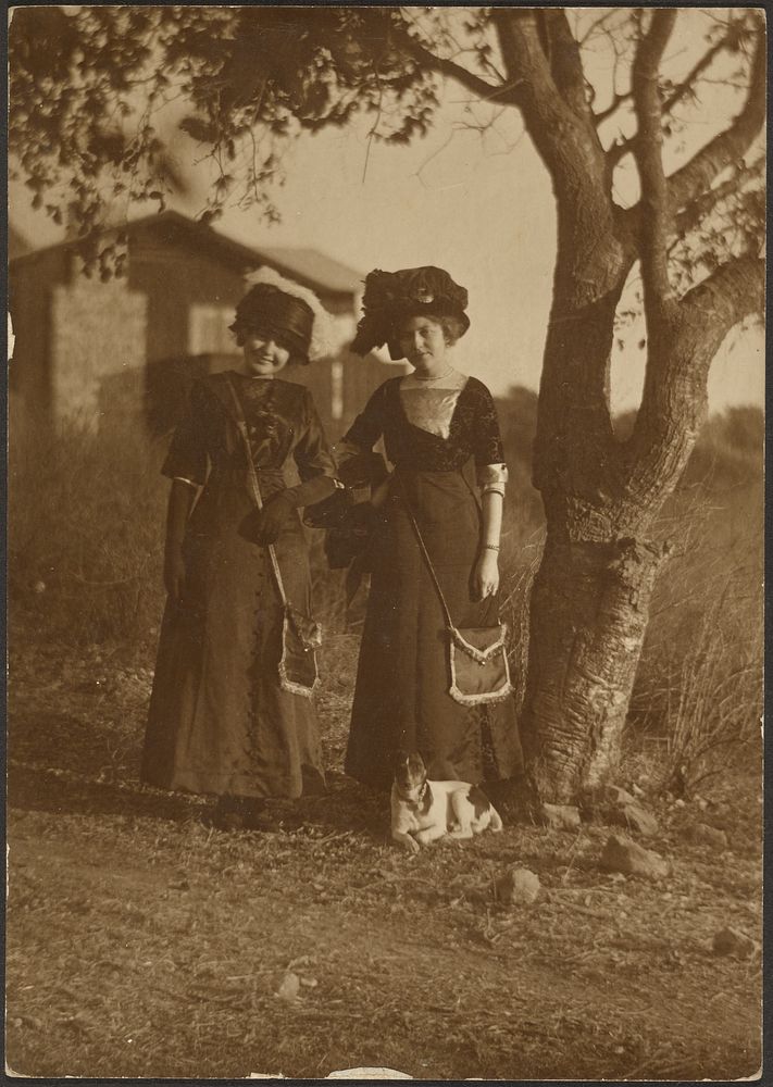 Portrait of Two Women Dressed Up in the Backyard by Louis Fleckenstein