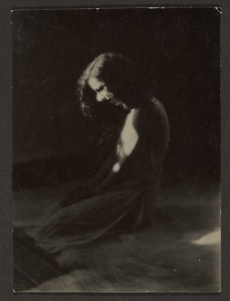Dancer Kneeling in Deep Shadow by Louis Fleckenstein