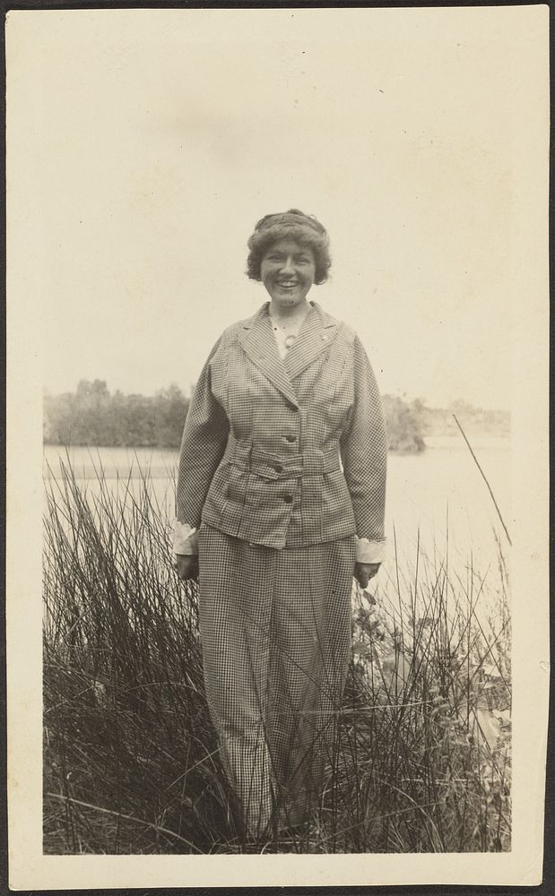 Woman Standing in Reeds by Louis Fleckenstein