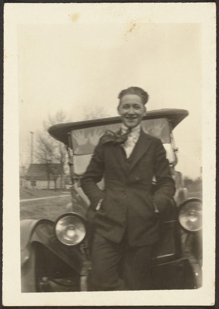 Boy Standing with Car by Louis Fleckenstein