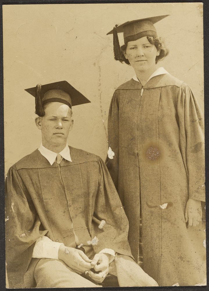 Boy and Girl in Cap and Gown by Louis Fleckenstein