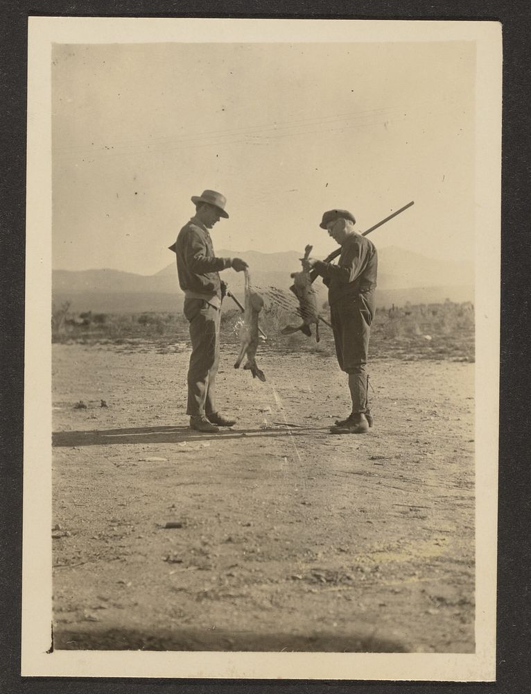 Fleckenstein and Man Holding Guns and Dead Jackrabbits by Louis Fleckenstein