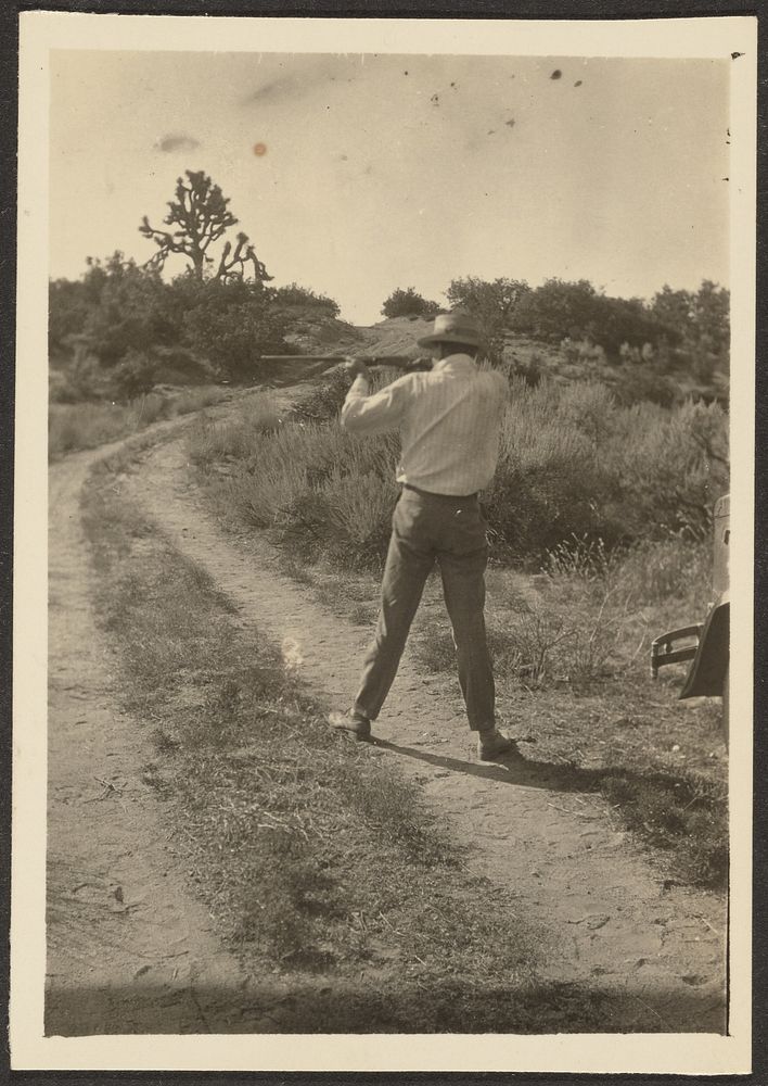 Man on Trail with Gun by Louis Fleckenstein