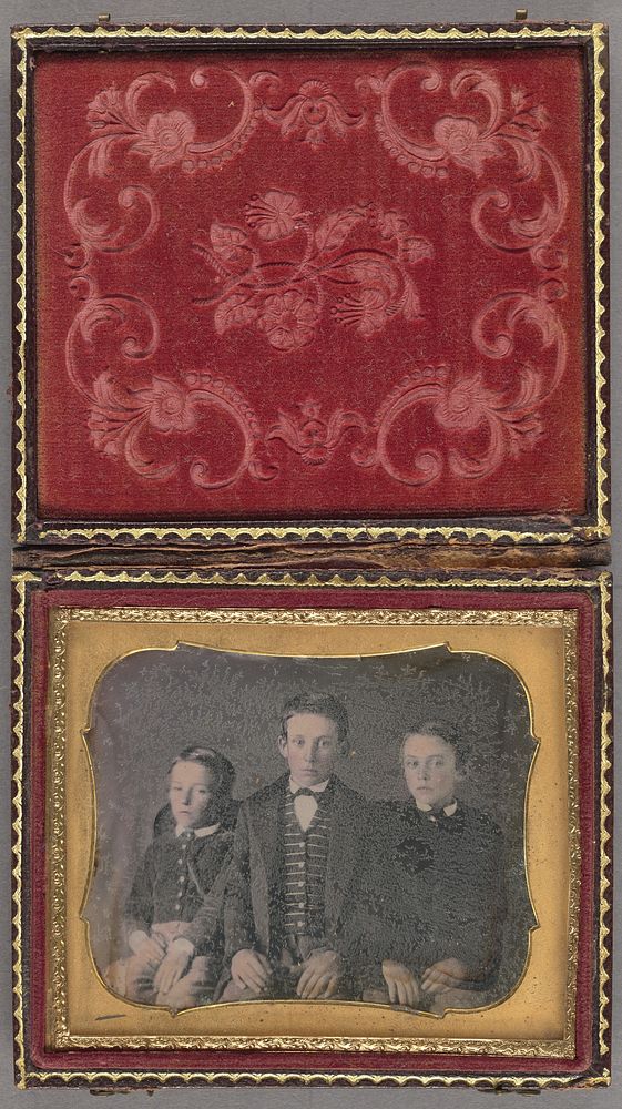 Portrait of Three Seated Boys
