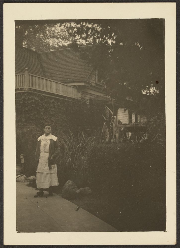 Woman in front of House by Louis Fleckenstein