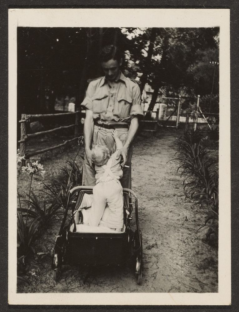 Man and Infant in Stroller by Louis Fleckenstein