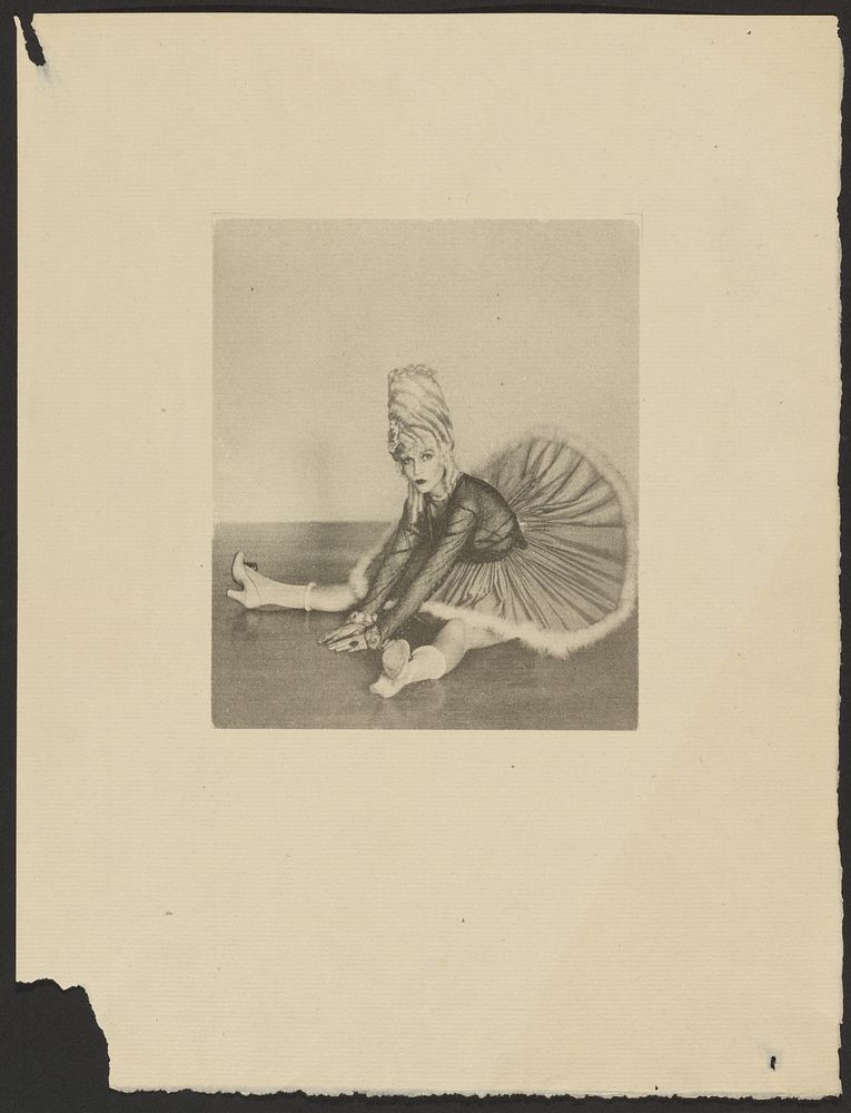 Woman in Can Can Costume Seated on Floor with Legs Spread Apart by Arthur F Kales