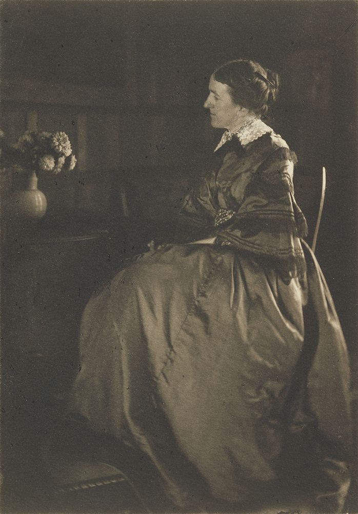 Self-portrait with Table and Flowers by Gertrude Käsebier