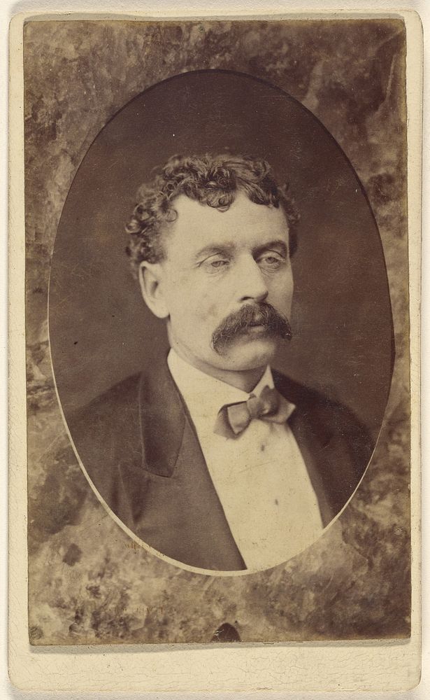 Unidentified man with moustache, in quasi-oval format