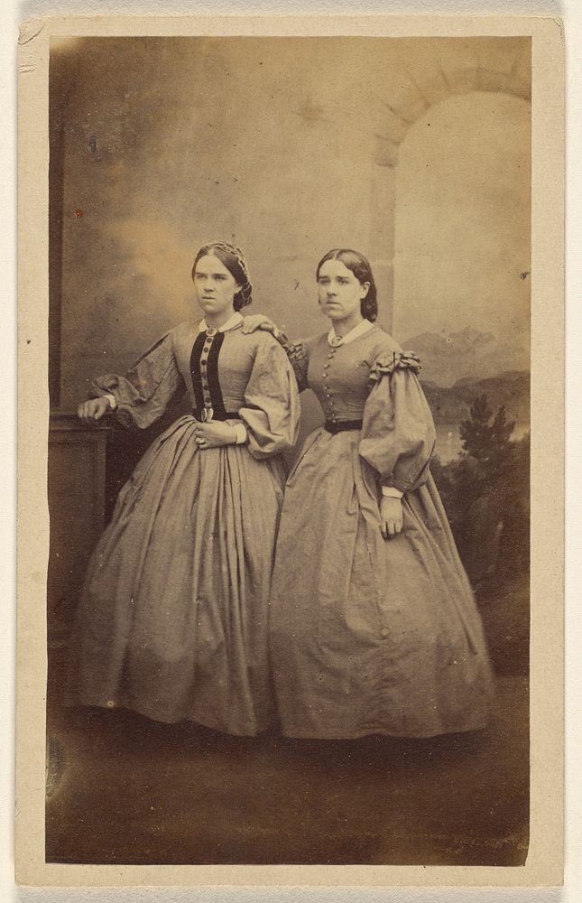 Two unidentified women, standing by Ross and Thomson
