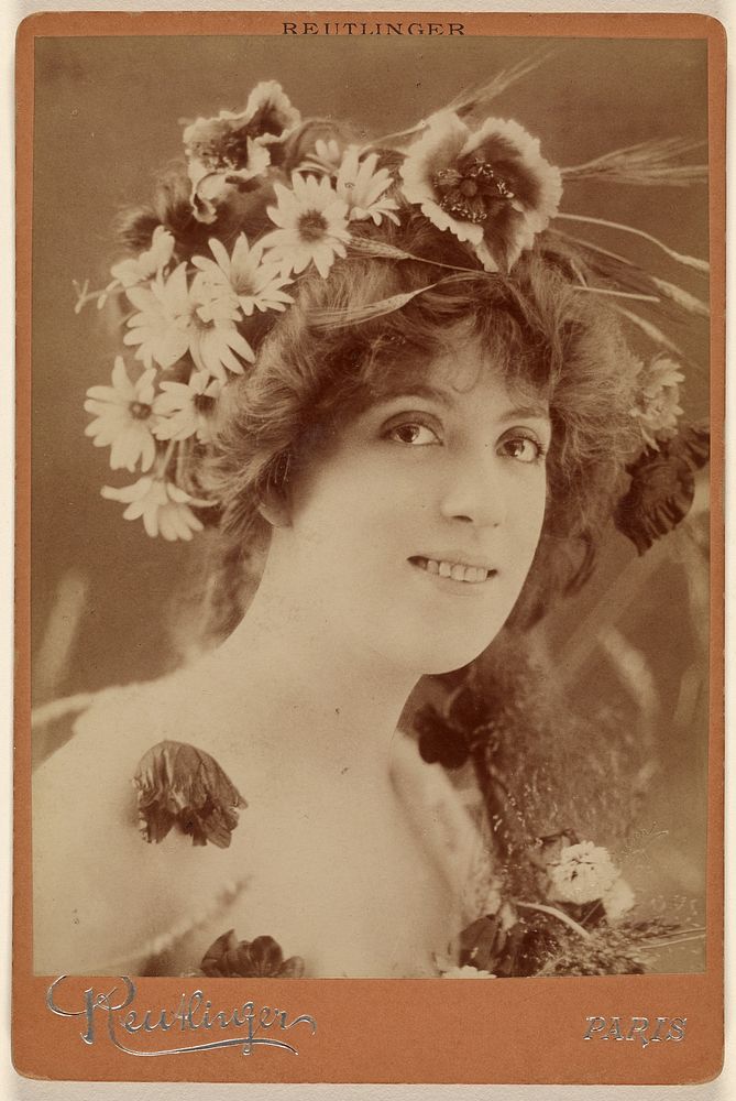 Faber l'Ete [Woman with flowers in her hair] by Emile Auguste Reutlinger